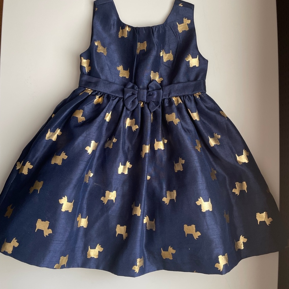 Beautiful royal blue dress with gold doggy prints.